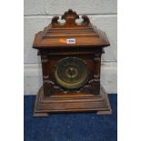 AN EARLY 20TH CENTURY OAK MANTEL CLOCK, by Ansonia Clock Company (two winding keys)