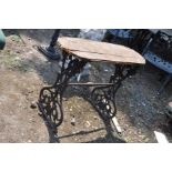 A VICTORIAN CAST IRON OBLONG TABLE, with later floor board top, 102cm x 34cm x 76cm high