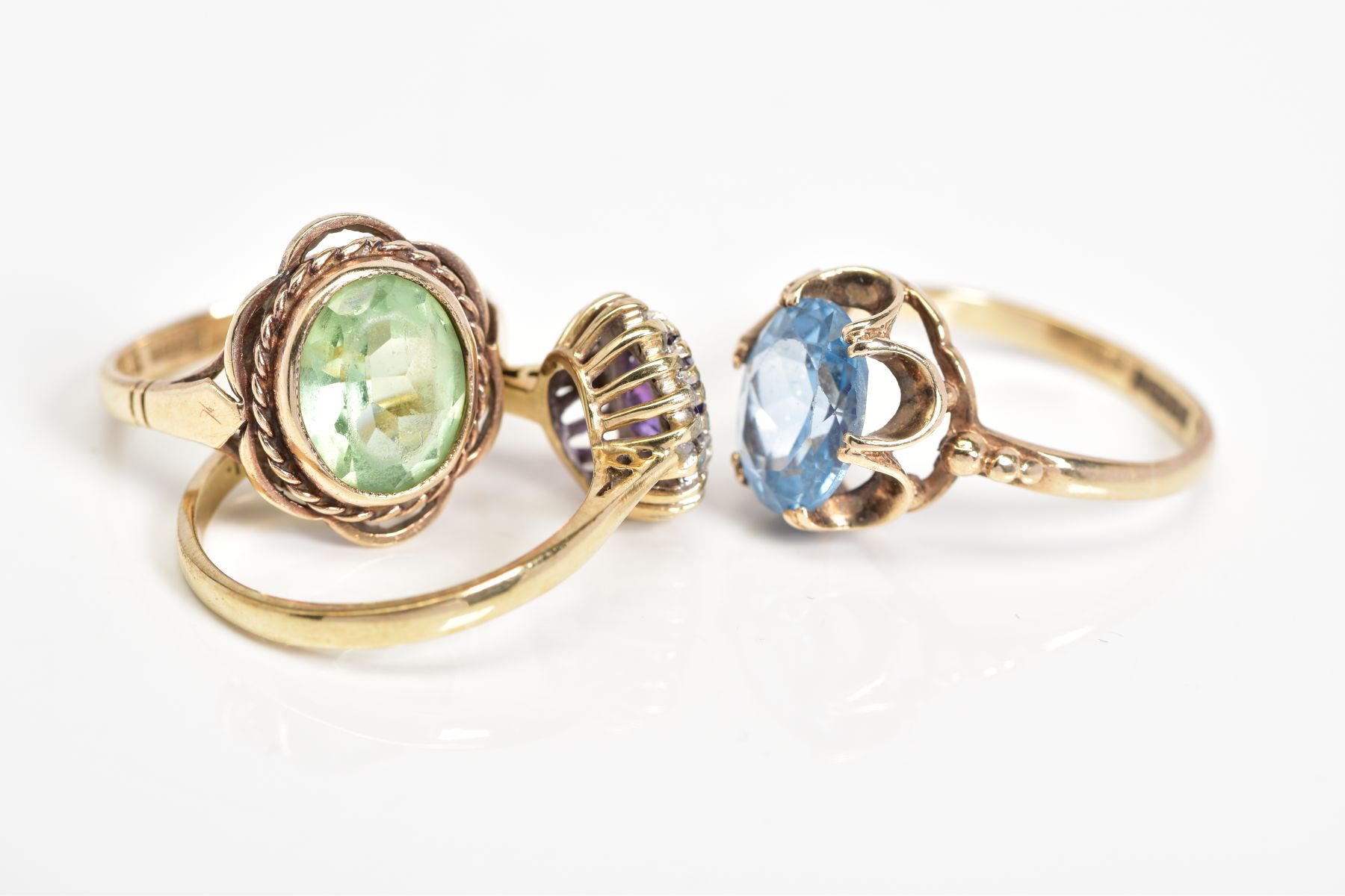 THREE 9CT GOLD GEM SET RINGS, to include an oval cut topaz within a scallop surround, with a 9ct - Image 3 of 3