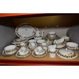 A WEDGWOOD 'AUTUMN VINE' PATTERN PART DINNER SERVICE, comprising meat platter, tureen and cover (