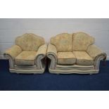 A FLORAL UPHOLSTERED TWO PIECE LOUNGE SUITE, comprising a two seater settee and an armchair (2)