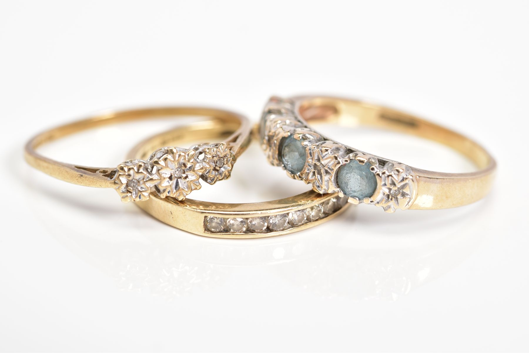 THREE 9CT GOLD GEM SET RINGS, the first a three stone single cut diamond ring within an illusion - Image 2 of 3