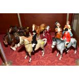 A GROUP OF CERAMIC FIGURES, HORSES, etc to include a Huntsman and Huntswoman (no markings),