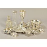 A GROUP OF SILVER, comprising an Elizabeth II candle holder, lacking a glass shade, loaded base,