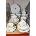A ROYAL ALBERT 'VAL D'OR' TEA SET, comprising six tea cups and six saucers, a coffee cup and saucer,