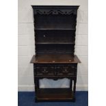 A SLIM EARLY TO MID 20TH CENTURY OAK DRESSER, with a wavy and pierced fretwork apron and similar
