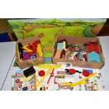 A TIMPO TOYS MEADOW FARM PLAYSET, not complete but includes buildings, cardboard play mat (all