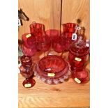 THIRTEEN PIECES OF CRANBERRY GLASS, comprising two jugs, approximate height 14cm, a set of six