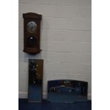 AN EARLY TO MID 20TH CENTURY OAK WALL CLOCK, approximate height 80cm (winding key and pendulum),