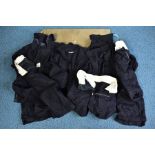 LARGE KIT BAG containing jackets and trousers, believed to be Royal Navy post WWII work smocks, five