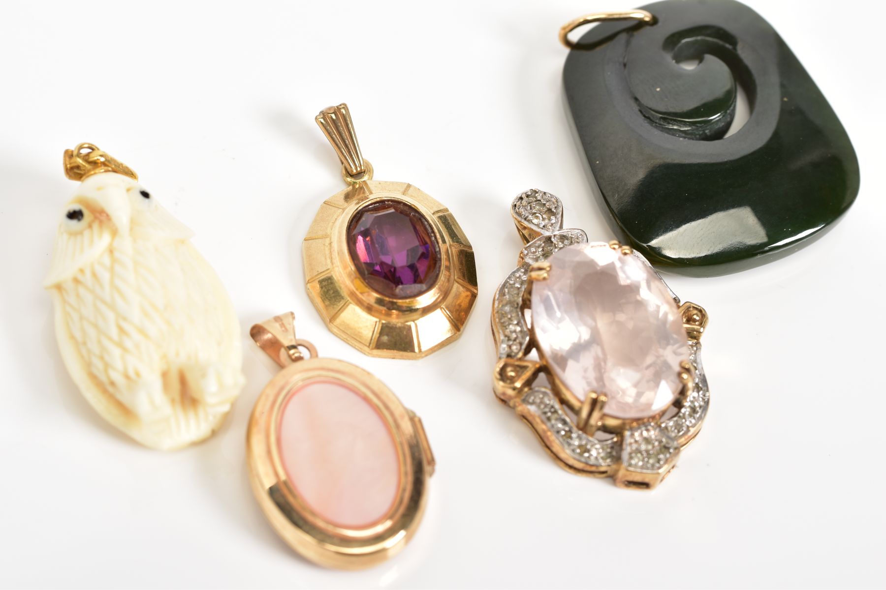 A SELECTION OF FIVE PENDANTS, to include a large oval cut rose quartz within a four claw setting and - Image 2 of 4