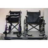 TWO WHEELCHAIRS, both with footrests, one is a Days with a metallic purple finish and a standard