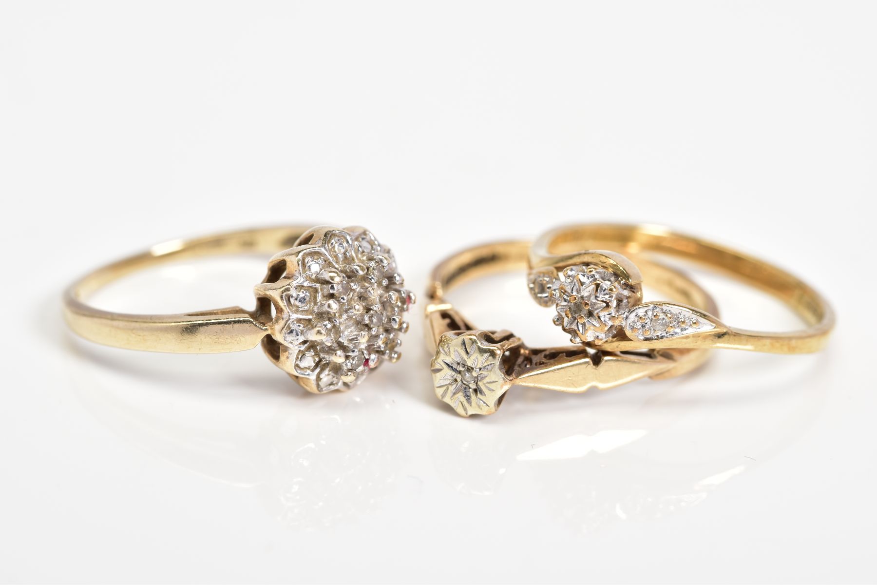 THREE 9CT GOLD DIAMOND SET RINGS, to include a raised single cut diamond cluster ring, stamped - Image 2 of 3