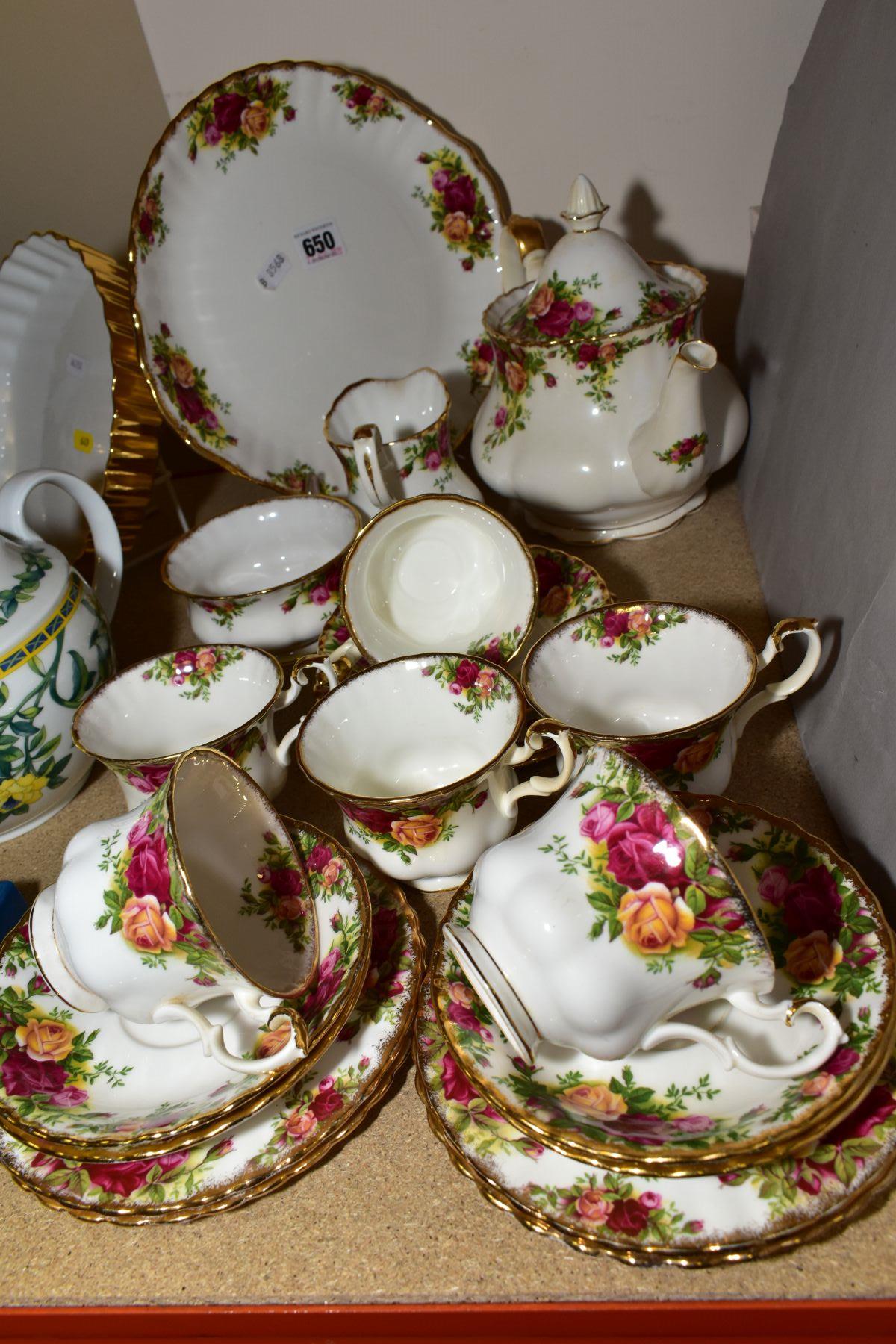 A ROYAL ALBERT OLD COUNTRY ROSES TEASET, six settings, seconds quality bread and butter plate,