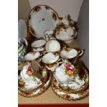 A ROYAL ALBERT OLD COUNTRY ROSES TEASET, six settings, seconds quality bread and butter plate,