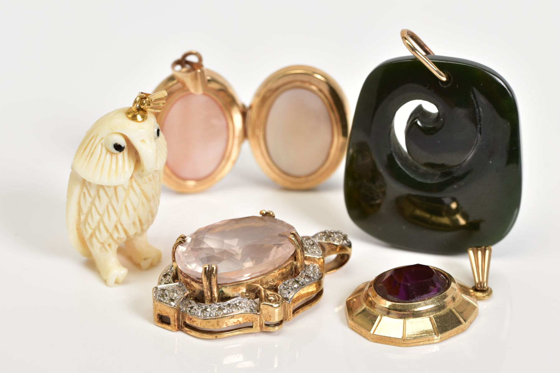 A SELECTION OF FIVE PENDANTS, to include a large oval cut rose quartz within a four claw setting and - Image 4 of 4