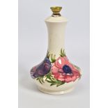 A MOORCROFT POTTERY BALUSTER TABLE LAMP, cream ground with pink/purple anemone design, printed