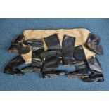A POST OFFICE SACK, containing five pairs of Military style calf length boots, mens sizes