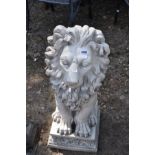 A MODERN RESIN FIGURE OF A MALE LION, on a foliate detailed plinth (all one piece) 80cm high