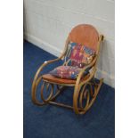 AN EARLY TO MID 20TH CENTURY BEECH BENTWOOD STYLE ROCKING CHAIR