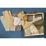 A SUITCASE CONTAINING TWENTY THREE ITEMS OF MILITARY STYLE WOMENS SKIRTS, sand, tan, brown, olive