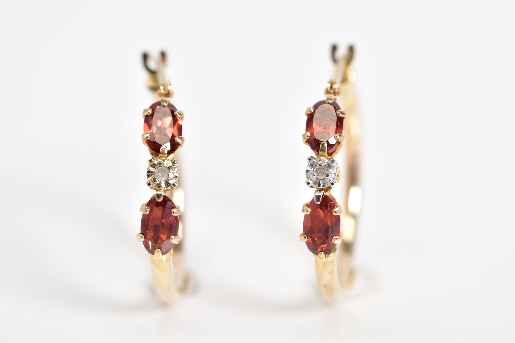 A PAIR OF TOURMALINE AND DIAMOND HOOP EARRINGS, each set with two oval cut reddish/brown tourmalines - Image 3 of 3