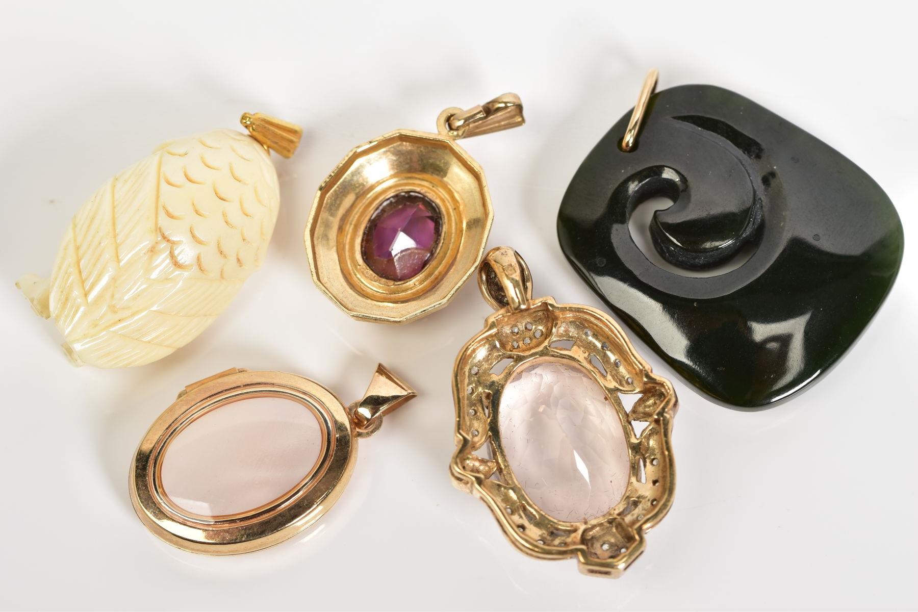 A SELECTION OF FIVE PENDANTS, to include a large oval cut rose quartz within a four claw setting and - Image 3 of 4