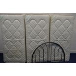 THREE SINGLE DIVAN BED WITH SPECIAL ORTHOPAEDIC MATTRESSES, and a metal 4' headboard (4)