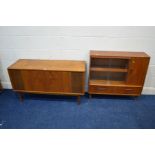 A MID 20TH CENTURY TEAK GLAZED BOOKCASE, with a single door, above two drawers, approximate width