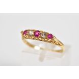 AN EARLY 20TH CENTURY 18CT GOLD RUBY AND DIAMOND RING, designed with three circular cut rubies