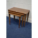 A GORDON RUSSELL WALNUT NEST OF THREE TABLES, largest table approximate width 61cm x depth 38cm x