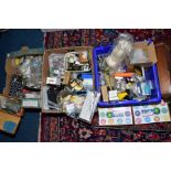 THREE BOXES CONTAINING A SELECTION OF CLOCK AND WATCH PARTS, to include watch repairer glasses,