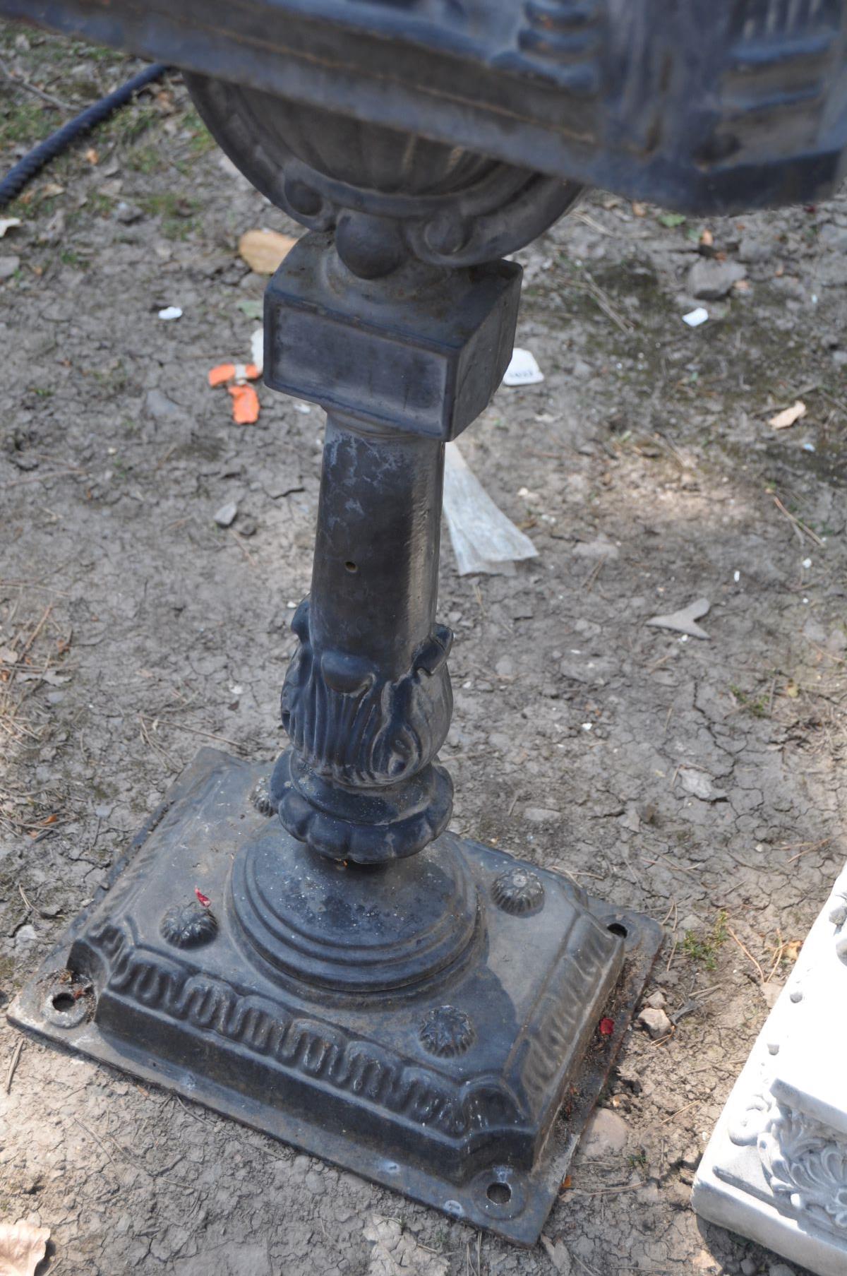 A MODERN CAST IRON POST BOX, with Chinese pagoda style roof, horse and rider detail to casting on - Image 3 of 4