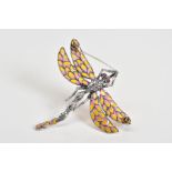 A PLIQUE A JOUR BROOCH, in the form of a dragon fly, with pink and yellow enamel wings and