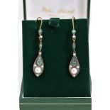 A PAIR OF SILVER GILT DROP EARRINGS, each drop pendant set with circular emeralds and round