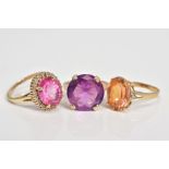 THREE GEMSTONE SET RINGS, to include a circular cut sapphire within a four claw setting, with a