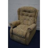A CELEBRITY FLORAL UPHOLSTERED ELECTRIC RISE AND RECLINE ARMCHAIR (PAT pass and working)