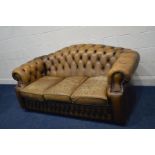 A MUTED BROWN LEATHER BUTTON BACK THREE SEATER SOFA with scrolled arms, width 193cm (leather