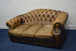 A MUTED BROWN LEATHER BUTTON BACK THREE SEATER SOFA with scrolled arms, width 193cm (leather