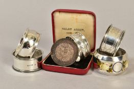 VARIOUS SILVER CIRCULAR NAPKIN RINGS, including a late Victorian example with enamelled floral