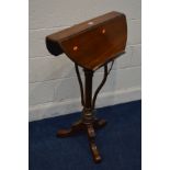 A LATE VICTORIAN WALNUT CIRCULAR ADJUSTABLE READING STAND/TABLE, with a screw type mechanism for its