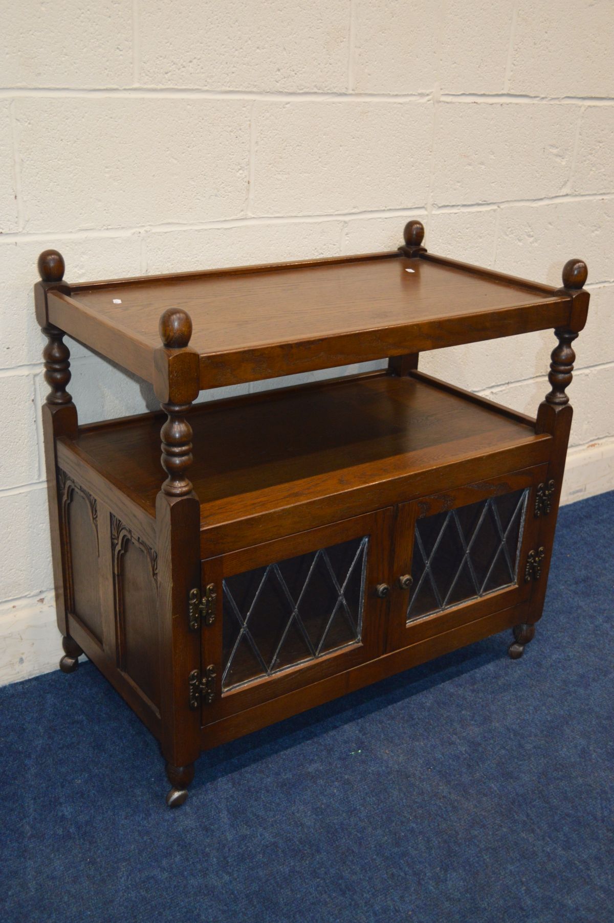 AN OLD CHARM OAK TWO TIER TROLLEY, with double led glazed doors, width 84cm x depth 48cm x height - Image 2 of 3