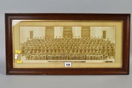 A LARGE GLAZED PERIOD FRAME, approximately 64cm x 32cm, containing a mounted sepia photograph, in