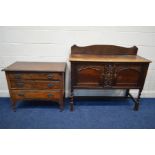 AN EARLY 20TH CENTURY OAK TWO DOOR PANELLED SIDEBOARD, on barley twist front legs, width 122cm x