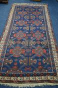 A LATE 19TH CENTURY EAGLE RAZAK BLUE GROUND RUG, the middle field with eight medallions framed by