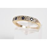 A 9CT GOLD HALF ETERNITY RING, set with three circular cut sapphires interspaced with four