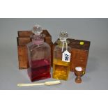 TRAVELLING CHEMIST'S CASE, containing two glass bottles with stoppers, coloured liquids, a wooden