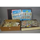 AN ALECTO STAFFORDSHIRE DOMESDAY SET IN SLIP CASE and two boxes of ephemera including postcards,