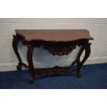 A REPRODUCTION MAHOGANY SERPENTINE FRONTED HALL TABLE with elaborate carving to the shaped frieze,