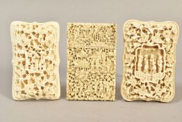 THREE MID TO LATE 19TH CENTURY CHINESE CANTON CARVED IVORY CARD CASES, one of rectangular form,